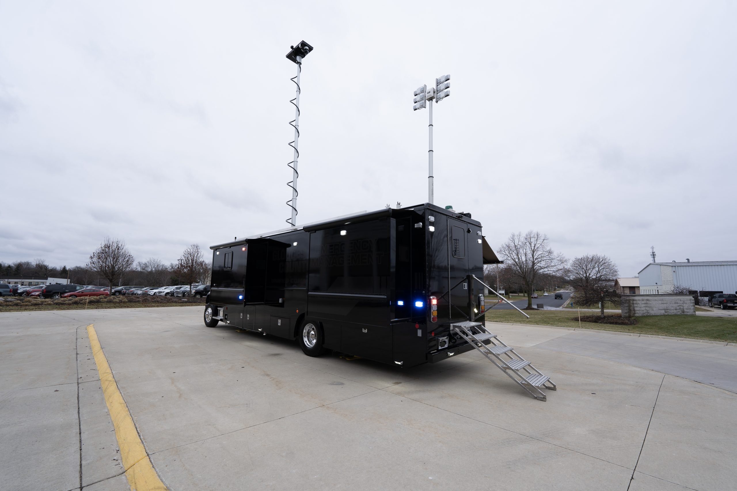LDV mobile command center with mast and scene lights.
